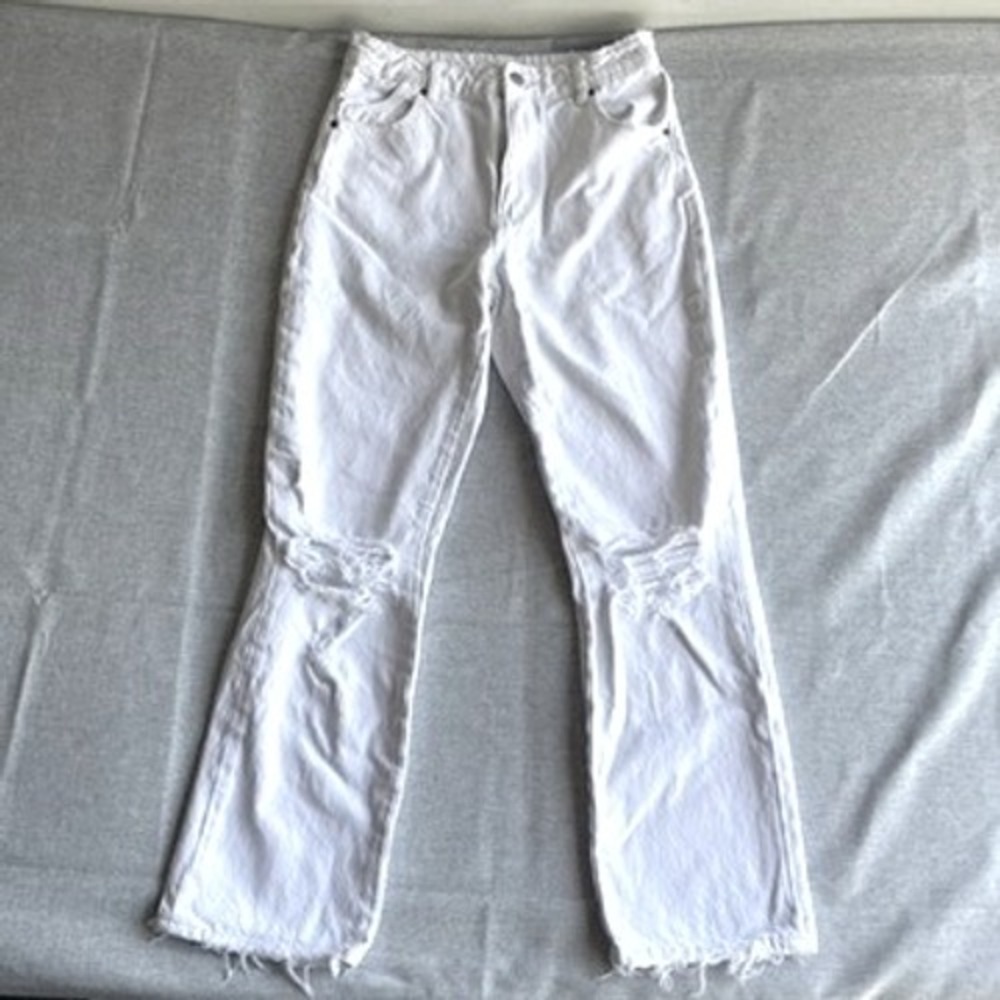 ROLLA'S White Flare Jeans with Knee Distress